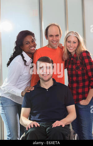 Portrait of engineering students one man with spinal cord injury in wheelchair and other one with Aspergers Stock Photo
