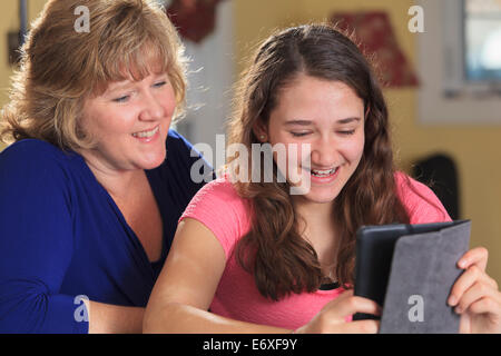 Mother and daughter using a tablet Stock Photo