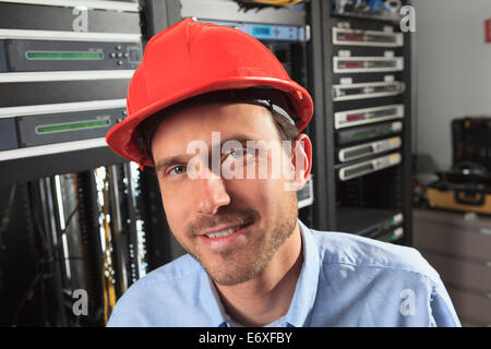 Network engineer in data distribution center Stock Photo