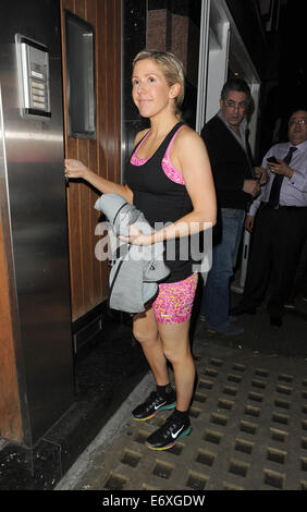 Ellie Goulding returning home from the gym, still wearing her workout clothes, including a pink sports bra and matching shorts  Featuring: Ellie Goulding Where: London, United Kingdom When: 26 Feb 2014 Stock Photo