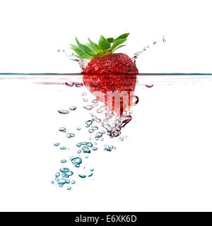 strawberry splash in transparent water, on white background Stock Photo