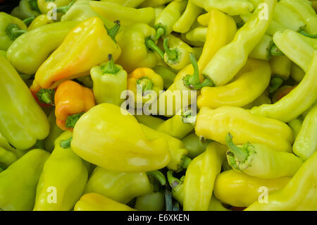 Full frame take of green peppers on display on a street market stall ...