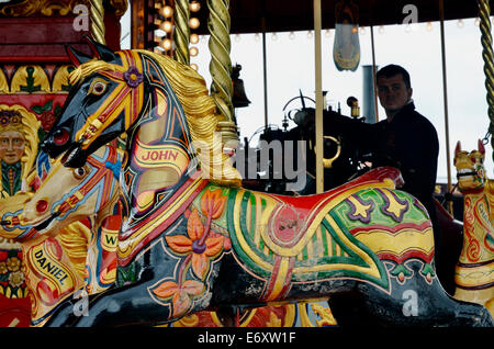 Beautifully painted gallopers on a traditional steam powered carousel at the Great Dorset Steam Fair 2014. Stock Photo