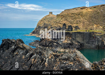 People taking part in coasteering activities at the Blue Lagoon, Abereiddy, Pembrokeshire, South Wales Stock Photo