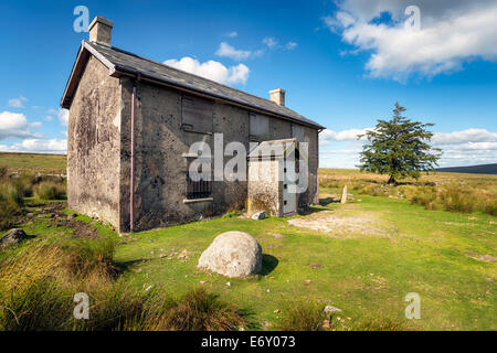 A derelict and abandoned farmhouse at Nun's Cross a remote part of Dartmoor National Park near Princetown in Devon Stock Photo