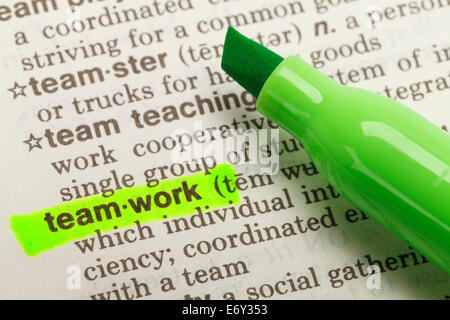 The Word Teamwork Highlighted in Dictionary with Green Marker Highlighter Pen. Stock Photo