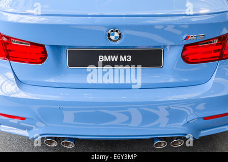 MUNICH, GERMANY - AUGUST 9, 2014: Rear view of new generation model BMW M3 - prestigious sports style car. Close-up details