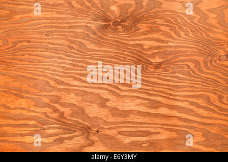 Brown Stained Pine Ply Wood Textured Background. Stock Photo