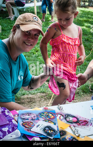 Family picnic reunion fun. Stock Photo