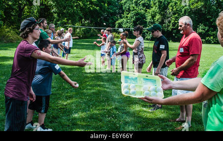 Family picnic reunion fun. Stock Photo