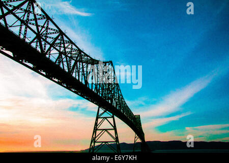 Silhouette of bridge at sunset in Astoria, Oregon Stock Photo