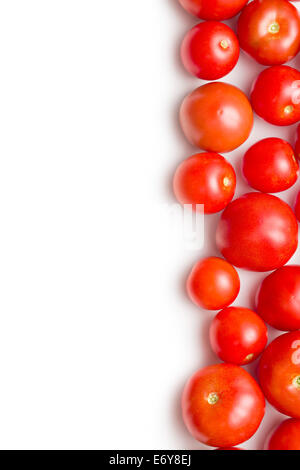 red tomatoes on white background Stock Photo