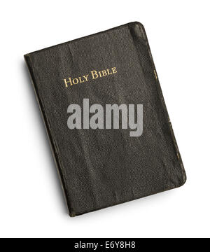 Well Used Bible with Red Pages Isolated on White Background. Stock Photo
