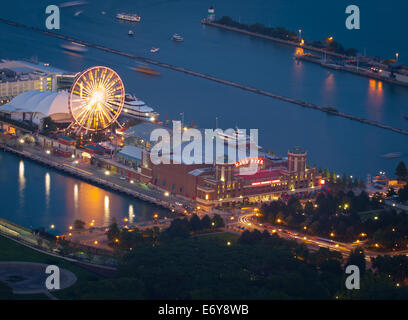 An aerial, night view of Navy Pier as seen from 360 CHICAGO (formerly the John Hancock Observatory). Chicago, Illinois. Stock Photo