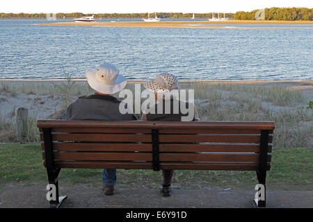 Elderly couple relaxing on the Gold Coast in Australia Stock Photo