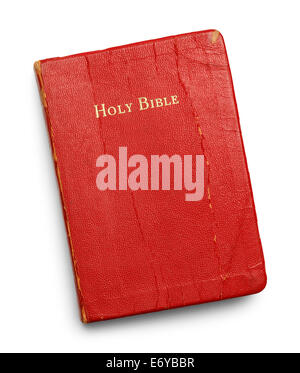 Well Used Bible with Red Pages Isolated on White Background. Stock Photo