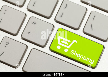 Close Up of Green Shopping Key Button on Keyboard. Stock Photo