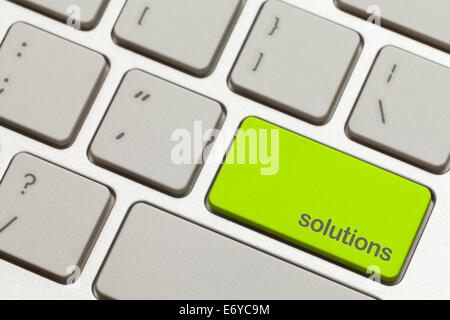 Close Up Green Solutions Button on Keyboard. Stock Photo