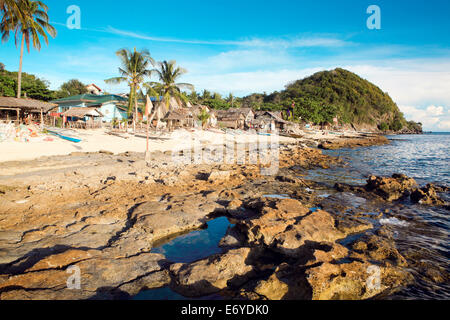 Reef and white sand beach on Apo Island in the Philippines Stock Photo