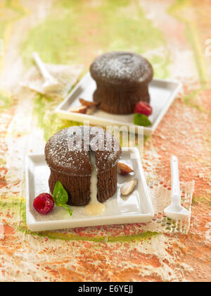 Dark chocolate fondant with a runny white chocolate filling Stock Photo