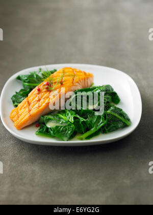 Grilled salmon with spinach Stock Photo