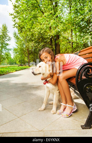 My most bellowed dog - teenage girl hug her pet Stock Photo