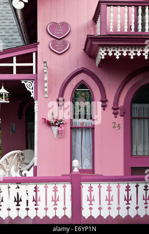 The Pink House Carpenter Gothic (Gingerbread) cottage in the campgrounds Oak Bluffs Martha's Vineyard Massachusetts New England Stock Photo