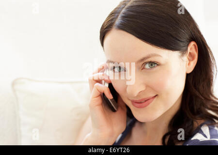 Woman talking on phone Stock Photo