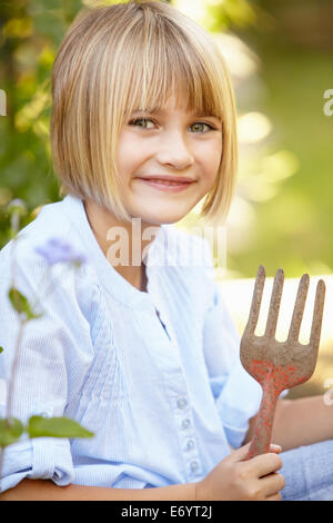 Young girl gardening Stock Photo