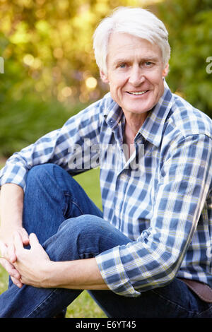 Senior man in garden Stock Photo