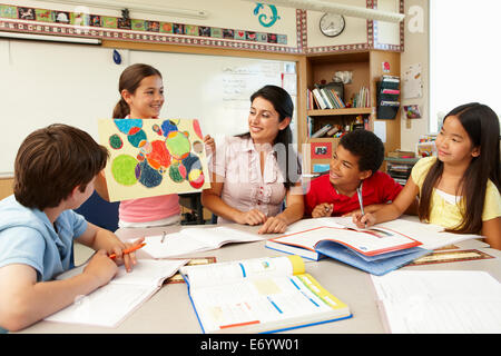 Teacher and schoolchildren in class Stock Photo