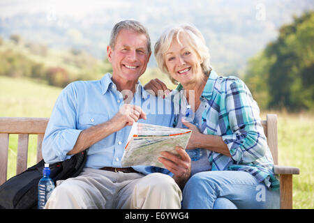 Senior couple on country walk Stock Photo