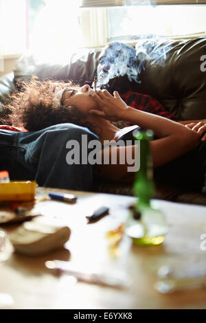 Couple Taking Drugs At Home Together Stock Photo