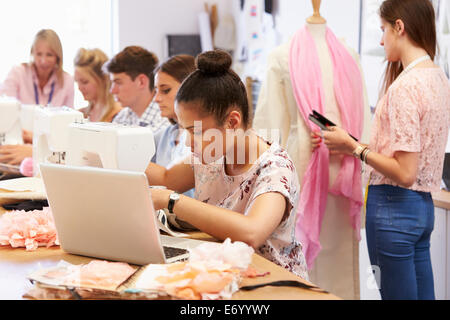College Students Studying Fashion And Design Stock Photo