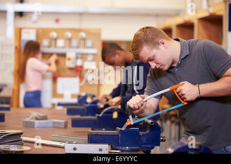 College Students Training To Become Electricians Stock Photo