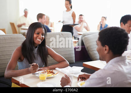 Couple Enjoying Breakfast In Hotel Restaurant Stock Photo