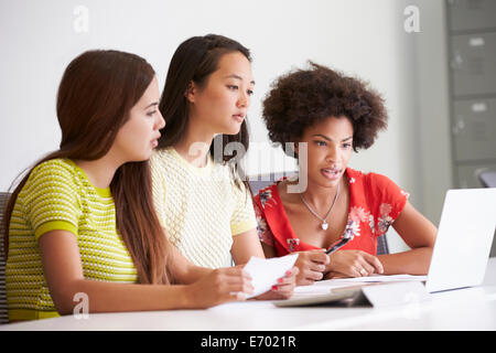 Three Women Working Together In Design Studio Stock Photo