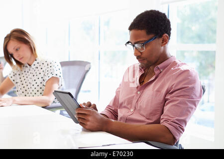 Design Team Collaborating On Project Together Stock Photo