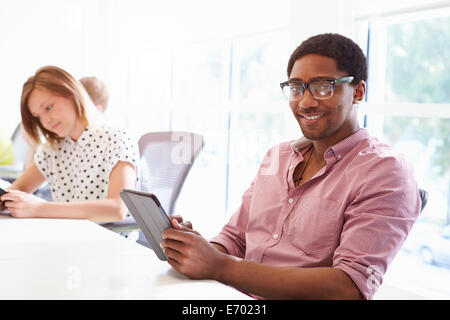Design Team Collaborating On Project Together Stock Photo