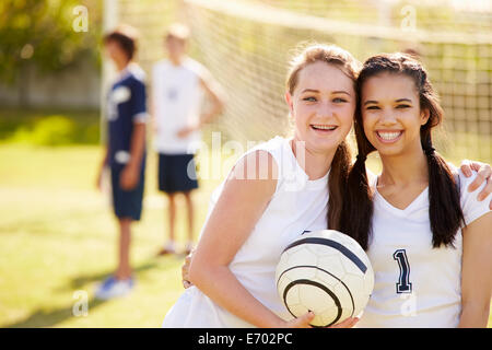 Members Of Female High School Soccer Team Stock Photo
