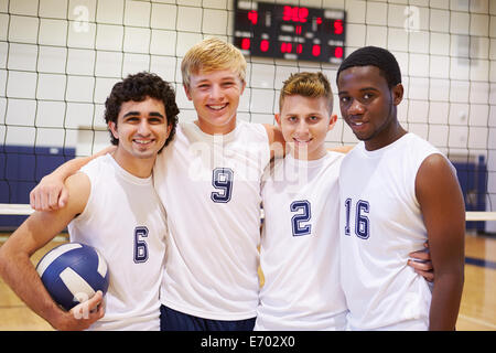 Members Of Male High School Volleyball Team Stock Photo