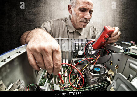 portrait of senior technician at work Stock Photo