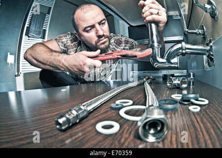 portrait of plumber at work Stock Photo