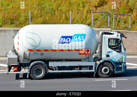 Short wheel base Flo Gas tanker lorry on motorway displaying Hazchem Hazardous Chemicals and Dangerous Goods information sign England UK Stock Photo