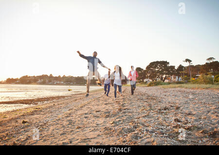 Group of friends having fun on beach Stock Photo