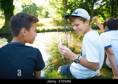 Boy holding fish Stock Photo