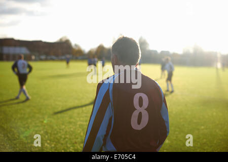 Rearview of football player number 8 Stock Photo