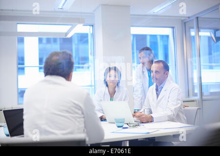 Group of doctors having discussion Stock Photo