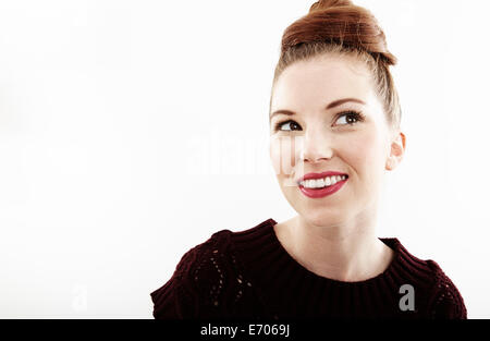Studio portrait of smiling beautiful young woman Stock Photo