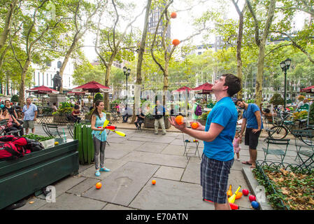 New York, USA. 1st September, 2014. The Bryant Park Jugglers teach others and enjoy Juggling with one another in Bryant Park September 2, 2014 in New York City. Credit:  Donald bowers/Alamy Live News Stock Photo